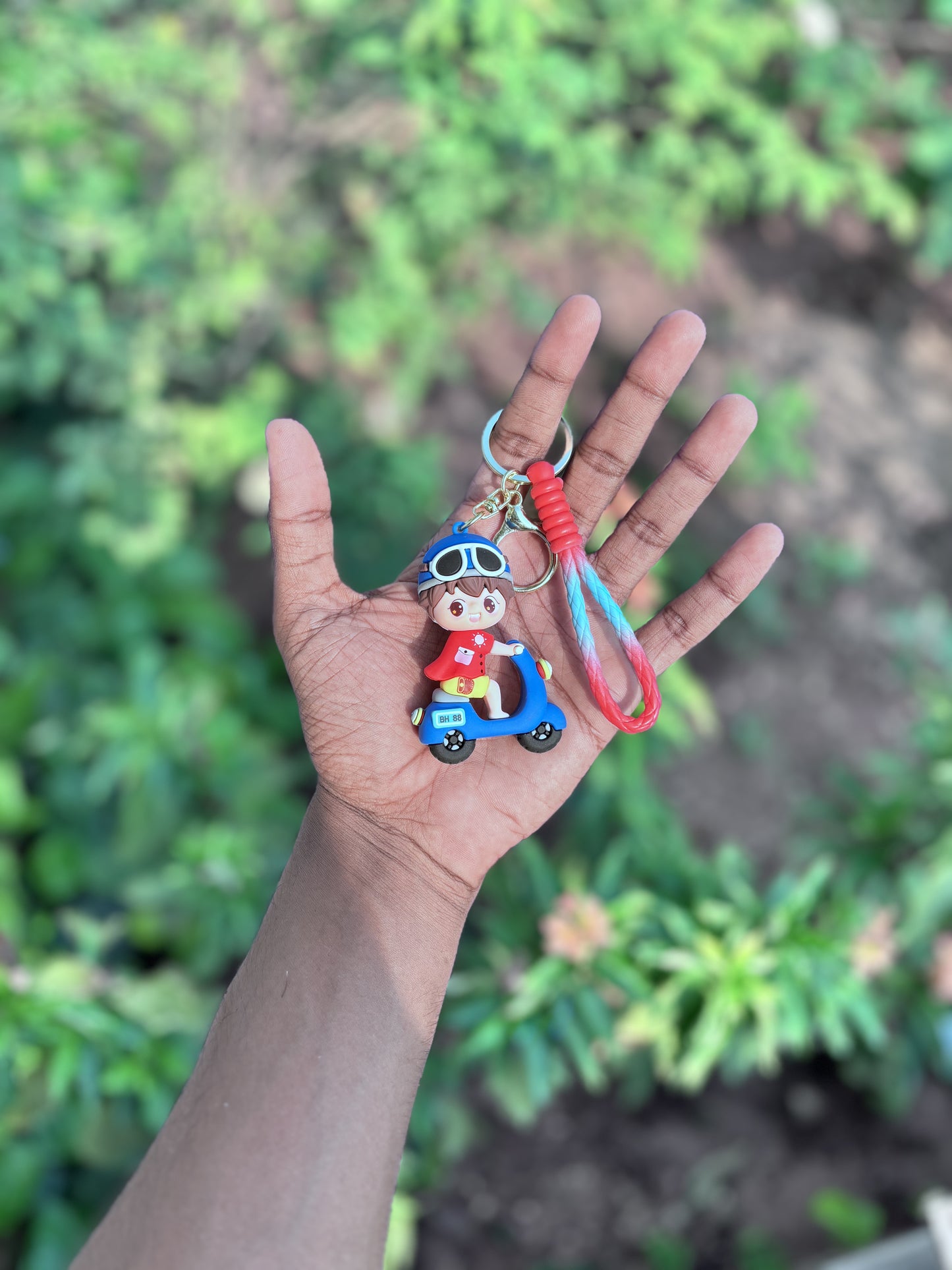 Cute Boy with Scooter - 3D Silicone Keychain